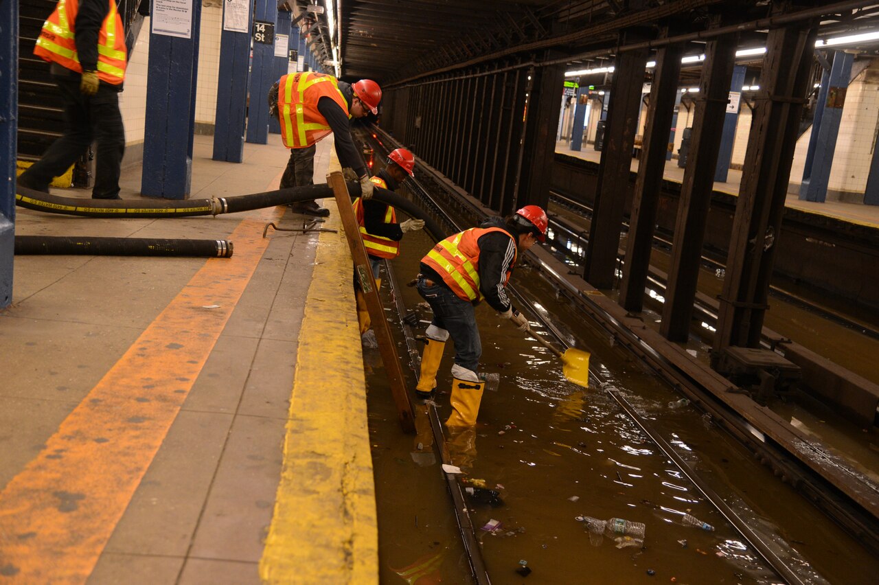 Water flooding across pavement from a broken water main